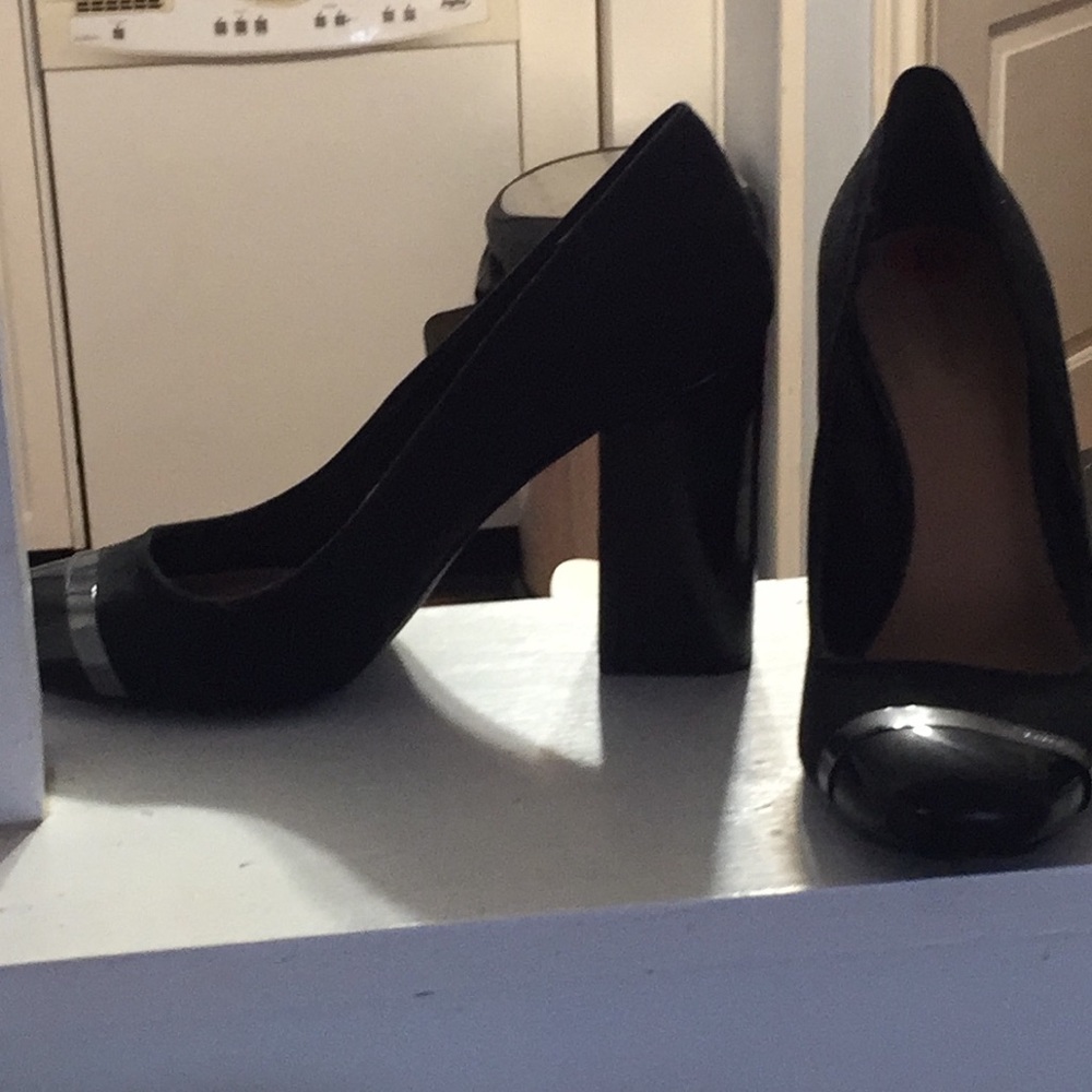 Calvin Klein pumps ; worn only once .